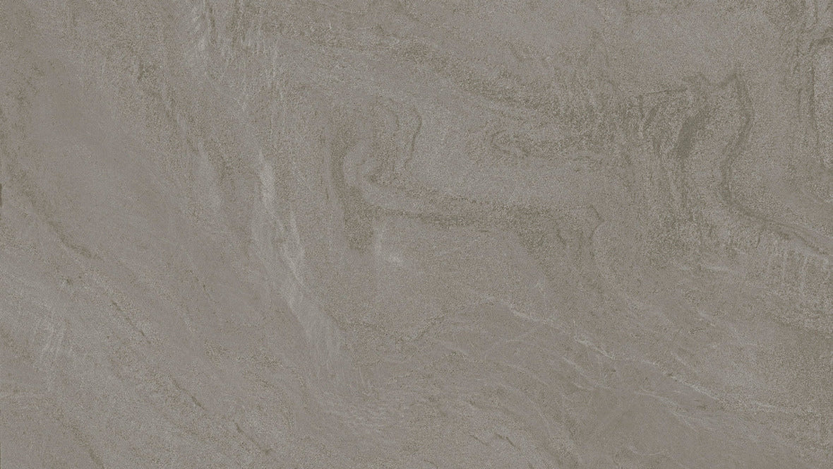 A close-up of a gray stone or concrete-like surface with subtle natural marbling and texture.